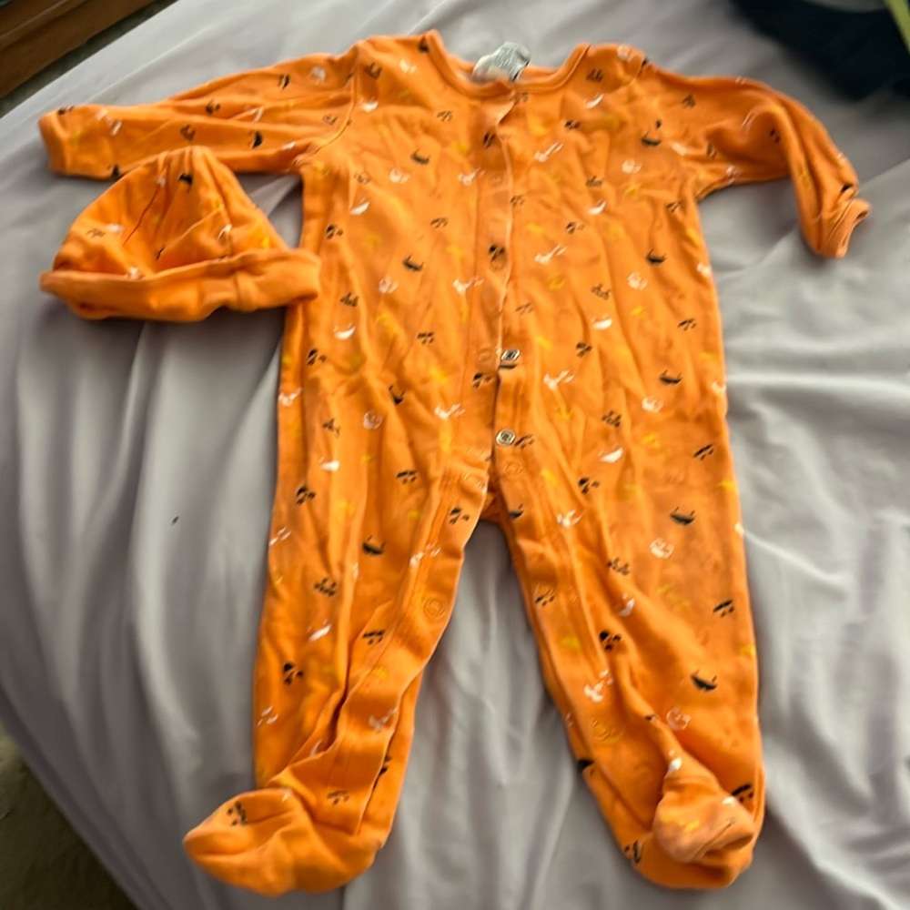 Halloween footed pajamas with matching hat. 9 months